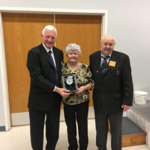 President Harvey Granatier presents appreciation gift to John & Beatrice Sidloski