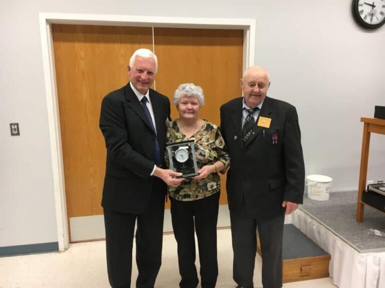 President Harvey Granatier presents appreciation gift to John & Beatrice Sidloski