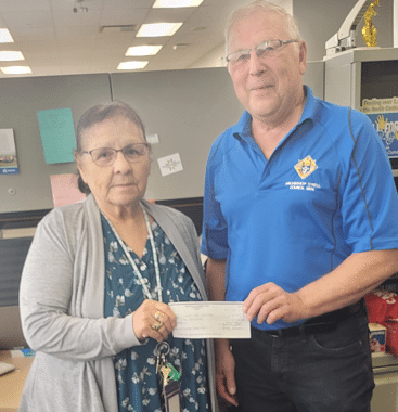 Charitable Foundation and Council #8896 Unite to Feed Those in Need 7 Dellia Pelletier (Chili for Children) receives cheque from GK Eugene