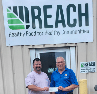 Charitable Foundation and Council #8896 Unite to Feed Those in Need 8 Matt Leisle (Ex Dir) receives cheque from GK Eugene