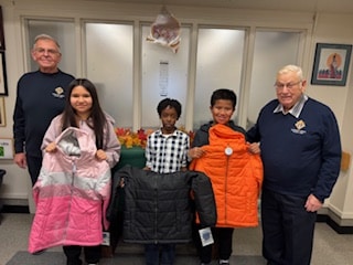 Three Grade 5 students from St. Augustine School by our Council’s Trustees, Len Jelinski and Wayne Rutten. Gerard Woynarski, F.S., also attended the presentation.