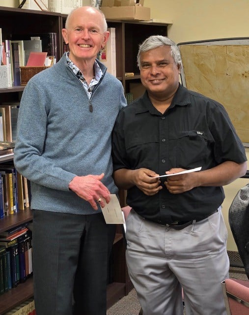 Holy Trinity Council #10401 in Regina Presents Their Incentive Cheque 1 Alex Wlodarczyk, presenting the cheque, Fr. Gaspar Lucas, Pastor of Holy Trinity Parish