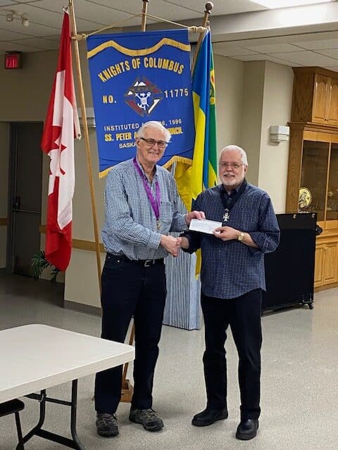 Father Ray Lukie, pastor of Saints Peter & Paul Parish, to support family activities at the parish.