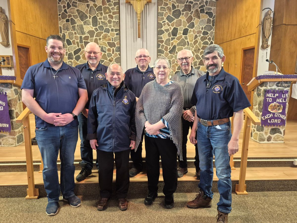 Pictured L-R Dan Laberge, Bill Brodner, Father Gerard Joy, Joe Brodner, Monica Wilson,Gary Kayter & GK Kurtis Sehn. $875 cheque donated to John the Baptist church. 