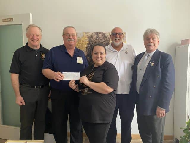 Holy Spirit Council #8905 in Saskatoon Presents Their Incentive Cheques 3 St. Mary's Warm Up - Saskatoon