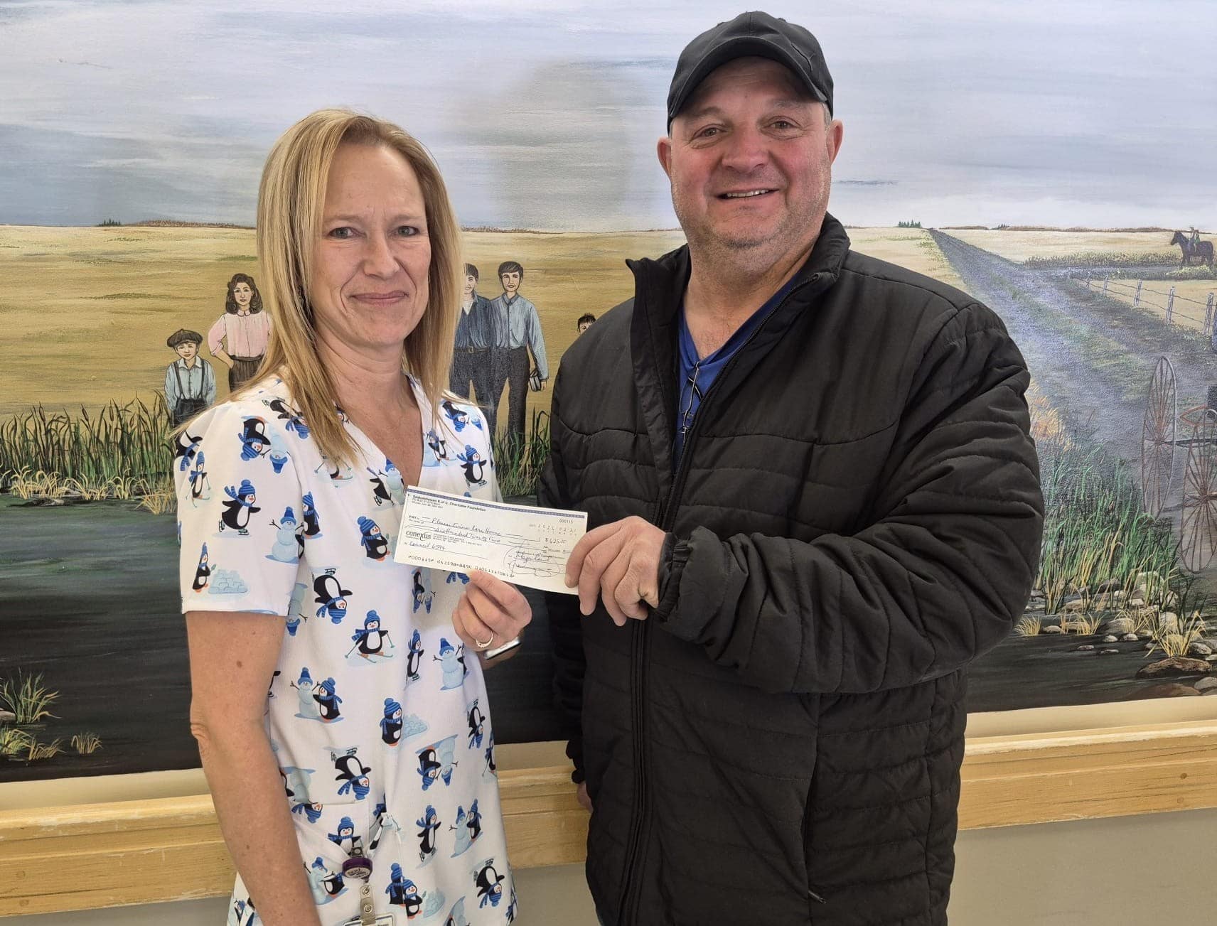 Wadena Pleasantview Care Home, cheque presented by GK Matthew Fedirko to Carmen Lazar