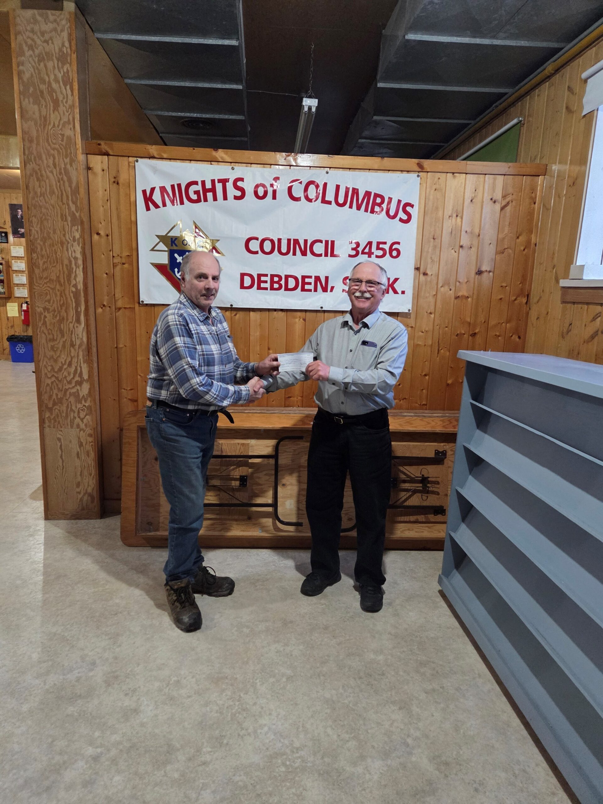 FS Claude Ruel (left) with Tony Lukan (on behalf of Big River Parish)