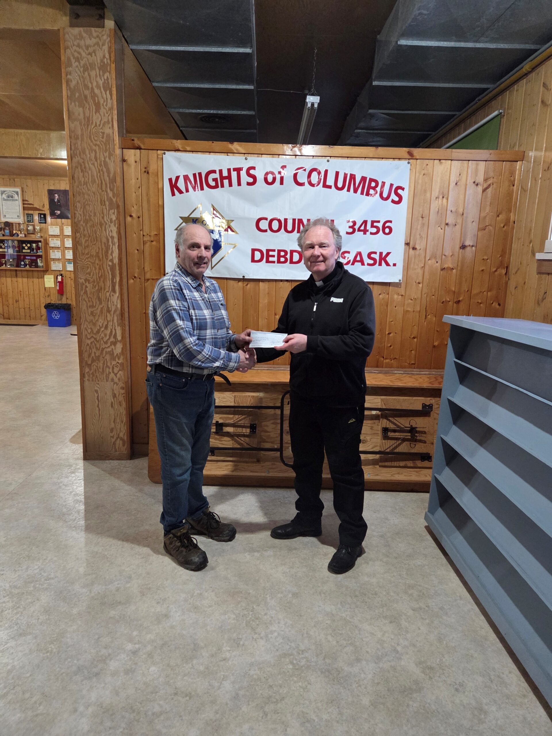 FS Claude Ruel (left) with Father Mariusz (on behalf of Debden Parish)