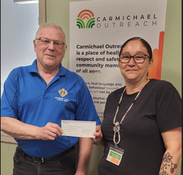 Sask K of C Charitable Foundation donates to Various Charities suggested by Archbishop O'Neill Council #8896 1 GK Eugene Achtemichuk presents a $1,000 ck to Tiffany Hill