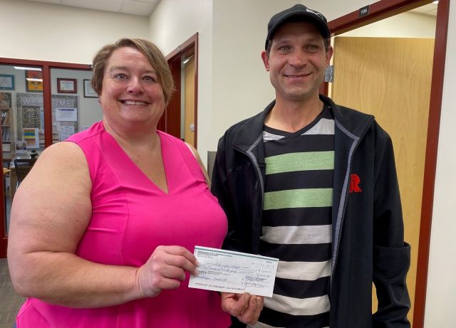 Sask K of C Charitable Foundation donates to Various Charities suggested by Fr Kunka Council #6594 1 Bro Mike Fedirko, DGK, presented to Principal at Kelvington School