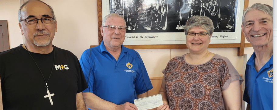 Sask K of C Charitable Foundation donates to Various Charities suggested by Archbishop O'Neill Council #8896 2 David Guzman (MC), Eugene Achtemichuk, Renee Sylvain (MC), Paul Ponak