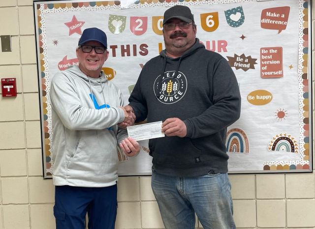 Sask K of C Charitable Foundation donates to Various Charities suggested by Fr Kunka Council #6594 4 Bro Mitchell Staszczak, Chancellor, presented to Principal at Wadena Elementary School