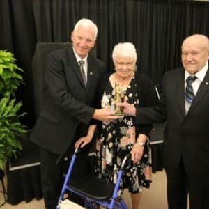 Alma & James Meier receive a statue from President Harvey Granatier at the Gala on September 18, 2026